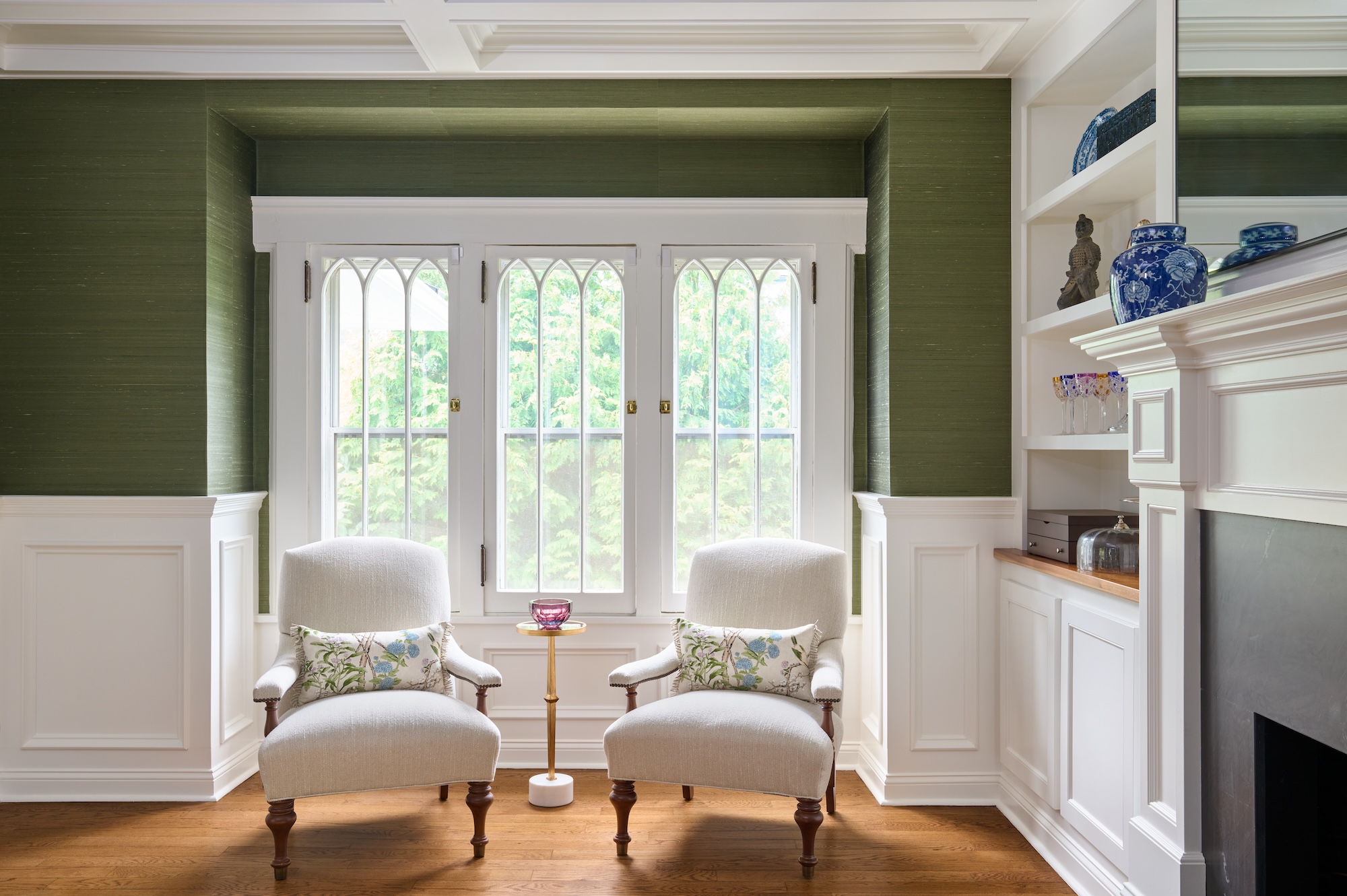 accent chairs in dining room with fireplace