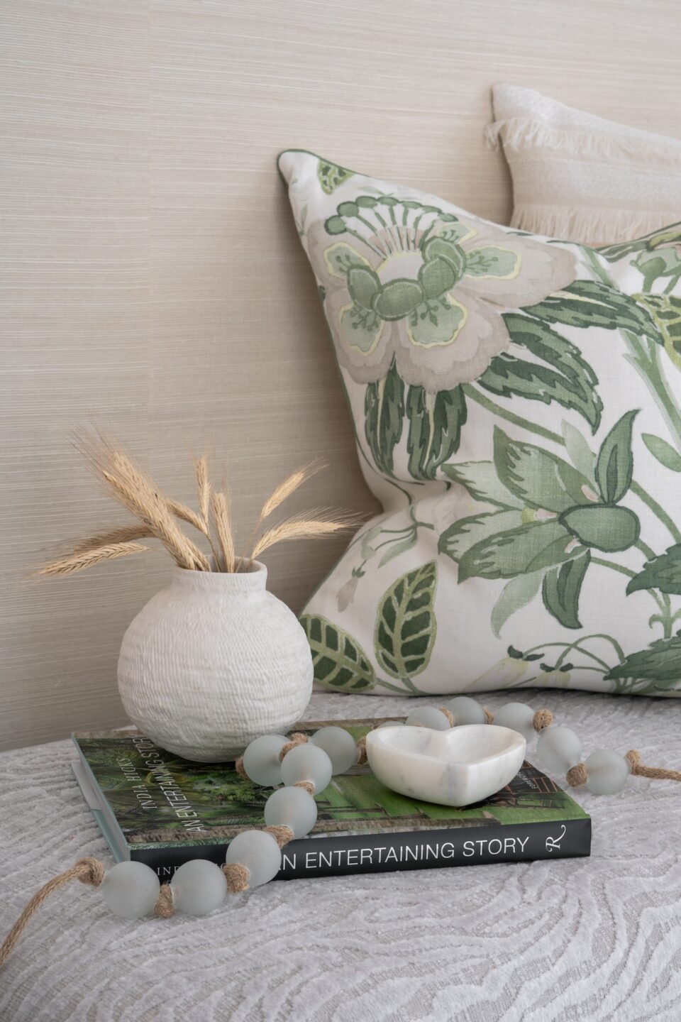 Close Up Of Accent Pillow With Green Flowers