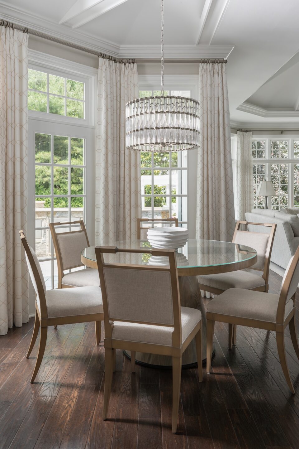 Round Glass Top Dining Table And Crystal Chandelier